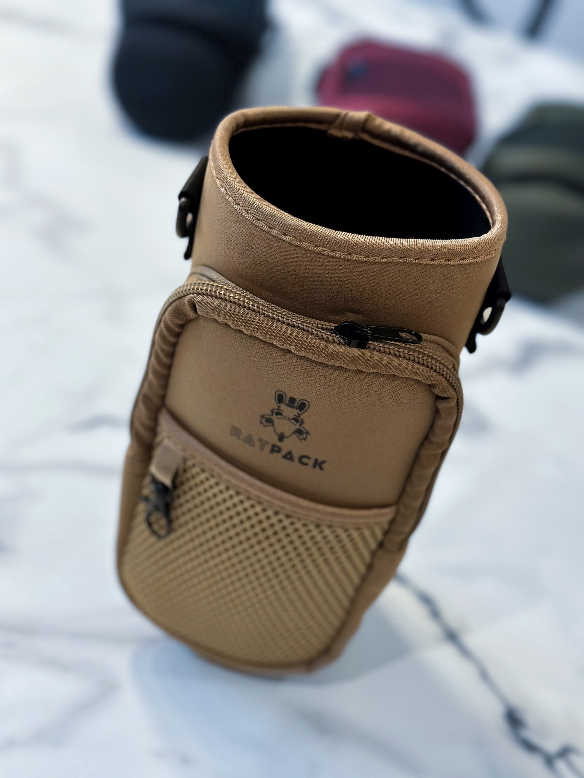 40 ounce/ 1.3 Liter water bottle sleeve insulated cross body carrier with pockets for phone and essentials, built in key chain beige brown