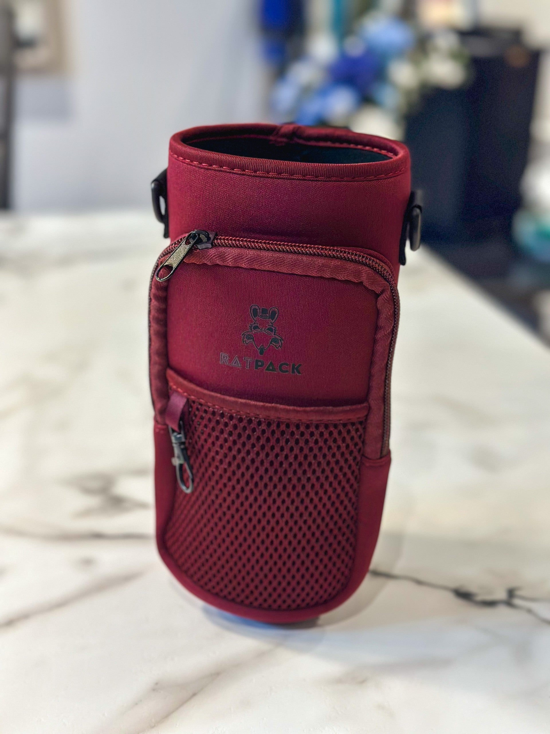 40 ounce/ 1.3 Liter water bottle sleeve insulated cross body carrier with pockets for phone and essentials, built in key chain burgundy